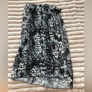 Buckle snake skin cover up skirt.